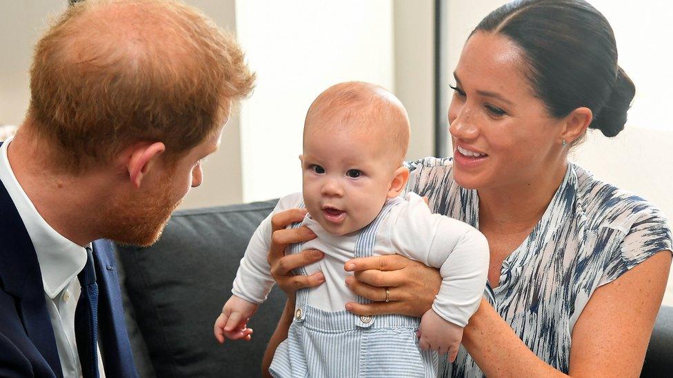 Prince Harry and his wife Meghan pictured with their baby son, Archie