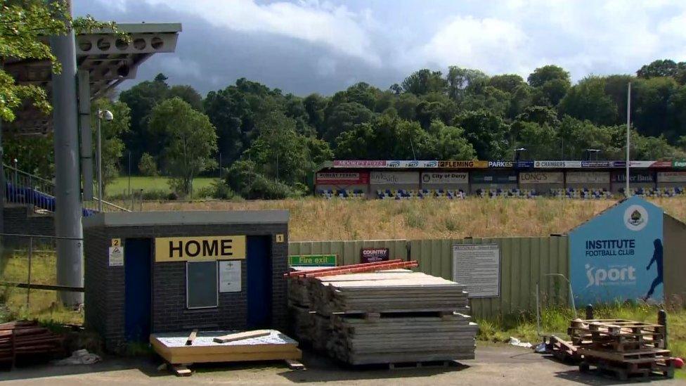 Overgrown weeds cover the pitch at the Riverside Stadium