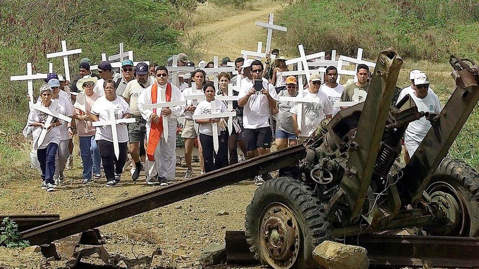 Protesters demonstrating against the use of a Puerto Rican island as a firing range