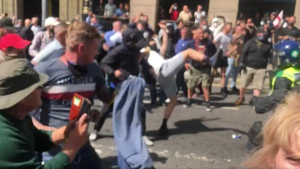 Police officers injured after far-right protests in London turned violent