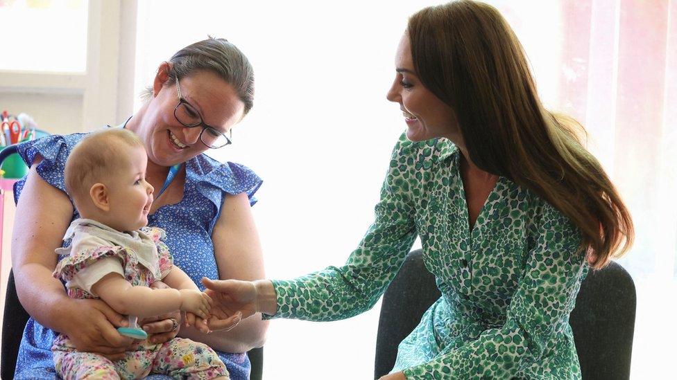 The Princess of Wales with a mother and baby