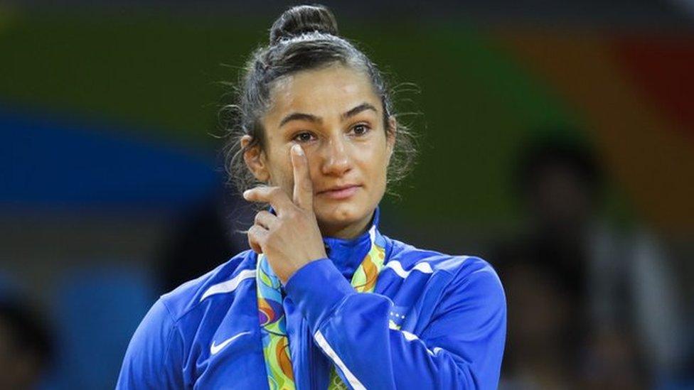 Gold medallist Majlinda Kelmendi of Kosovo waves to the crowd in Rio