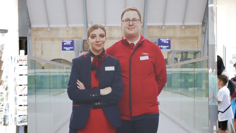 Large photograph of LNER staff Hayley and Ryan, part of the exhibition