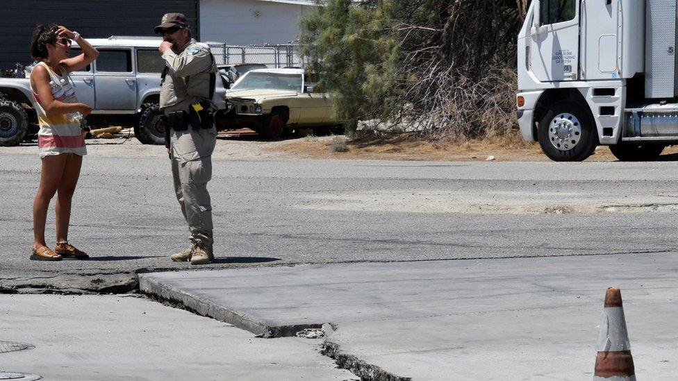 One of several surface cracks is seen in a road after an earthquake near Trona, California, U.S., July 6, 2019.