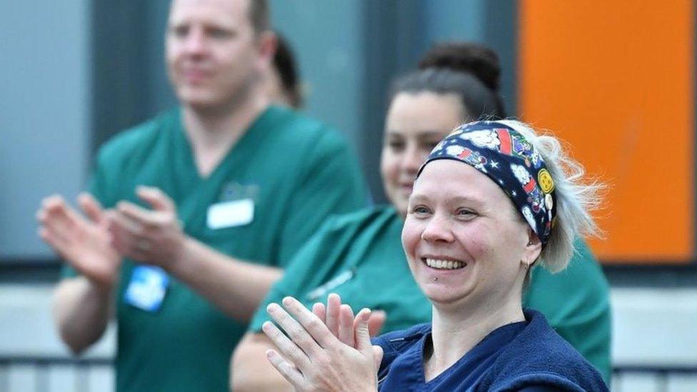 Medical staff join in a clap for carers at Glan Clwyd Hospital at Bodelwyddan