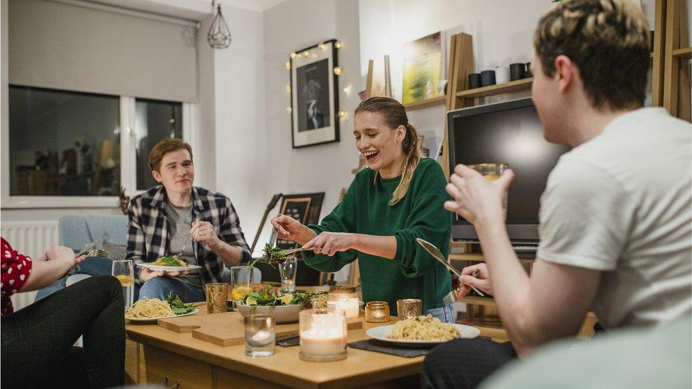 Couples eating at home