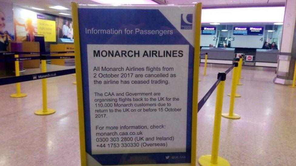 Monarch Airlines information board at Birmingham International Airport