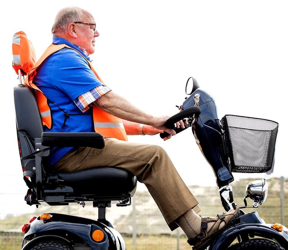 Man using a mobility scooter