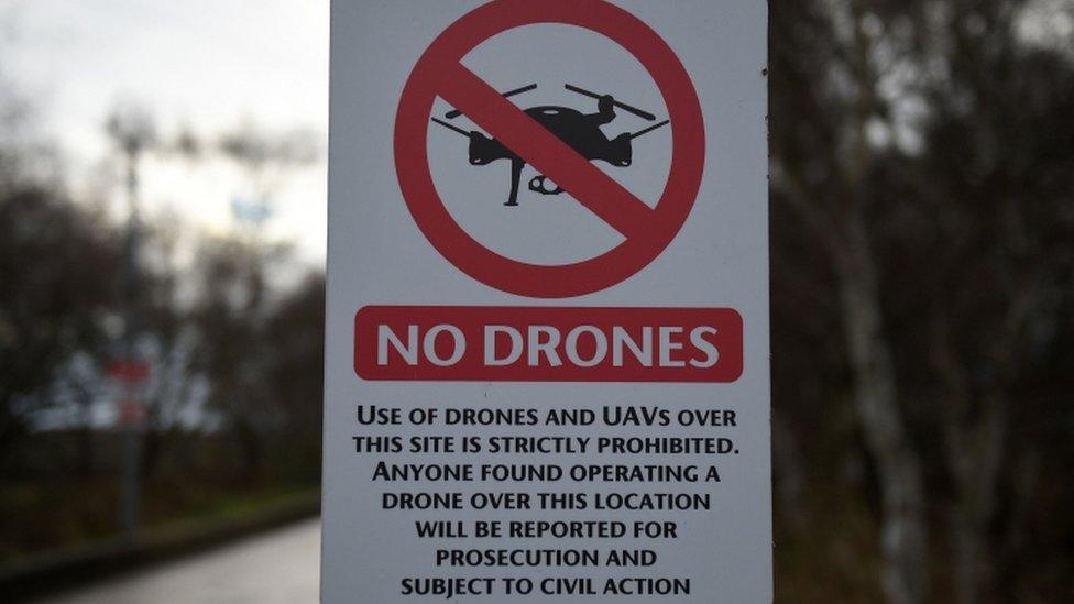 A "No Drones" sign alerting members of the public that the use of drones or unmanned aerial vehicles (UAV) is prohibited, is pictured outside Manchester United"s Carrington Training complex in Manchester, north west England on December 20, 2018.