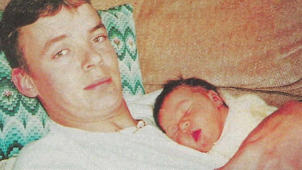 Simon Smith with his baby daughter Lauren
