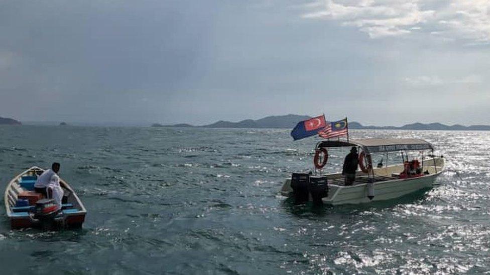 Boats on the water in a search and rescue mission