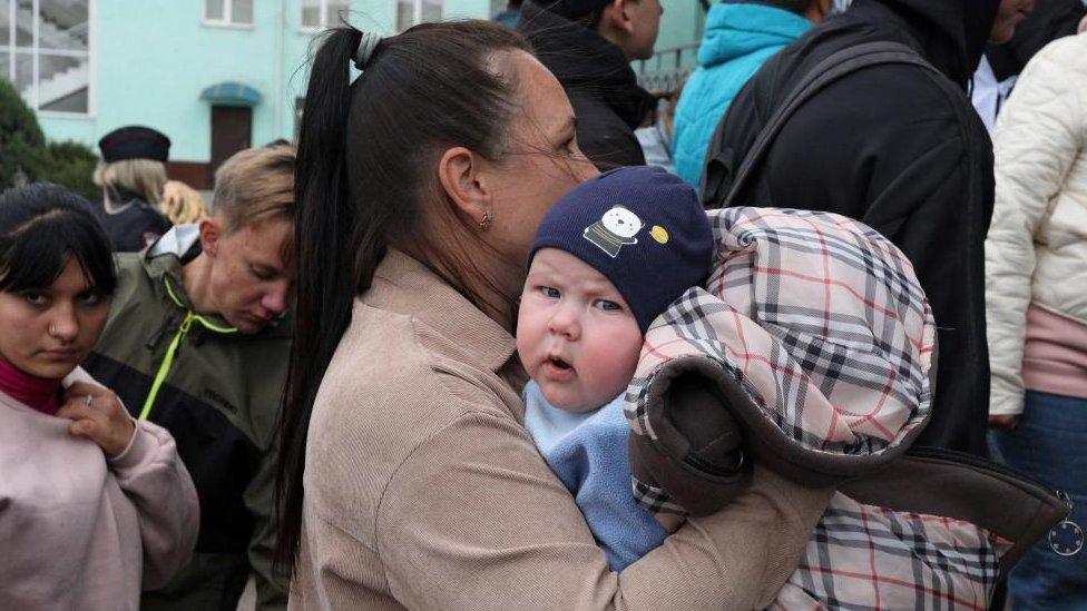 Civilians from the Russian-controlled Kherson region of Ukraine arrive in Dzhankoi