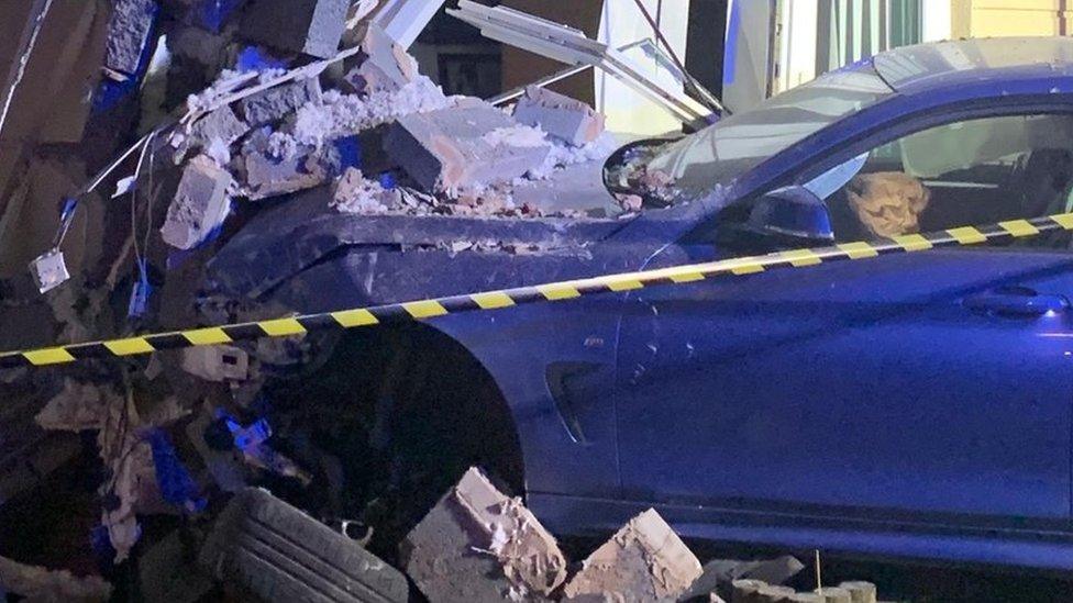 The car hit a three-storey building