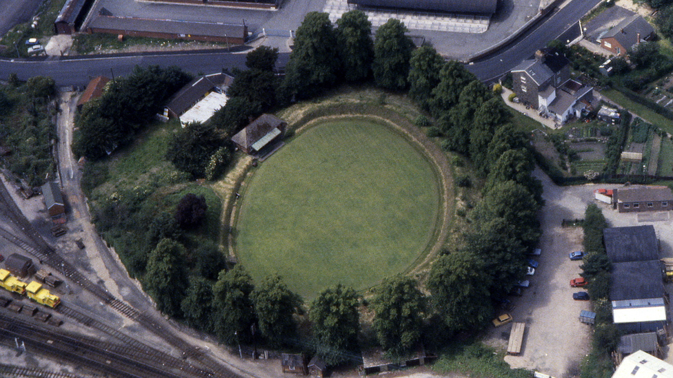 Remains of Welshpool's motte and bailey castle from the air