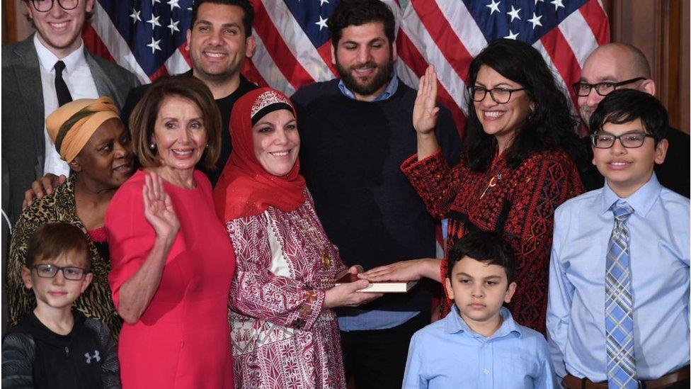 US House Representative Rashida Tlaib (D-MI) participates in a ceremonial swearing-in from Speaker of the House Nancy Pelosi (D-CA) at the start of the 116th Congress at the US Capitol in Washington, DC, January 3, 2019