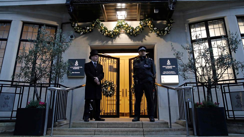 A policeman stands guard outside London's King Edward VII hospital