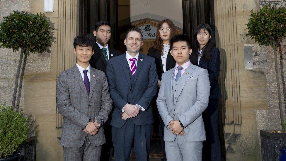 Head teacher Andrew Allman with some of the school's pupils