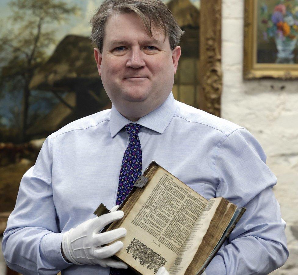 Bloomfield Auctions managing director Karl Bennett with the Geneva Bible