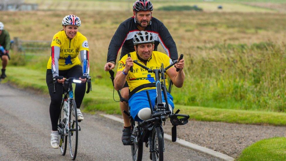 Ben Parkinson riding an adapted bike