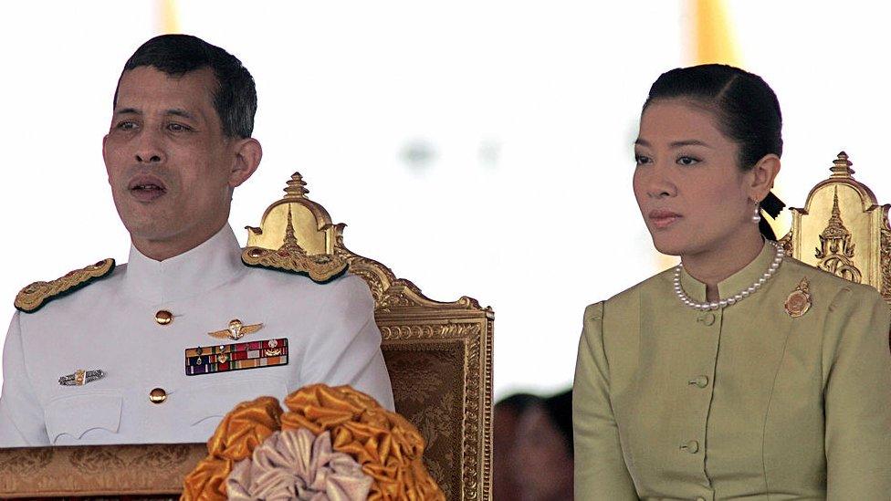 Thai Crown Prince Maha Vajiralongkorn (L) sits next to Princess Srirasmi (R)