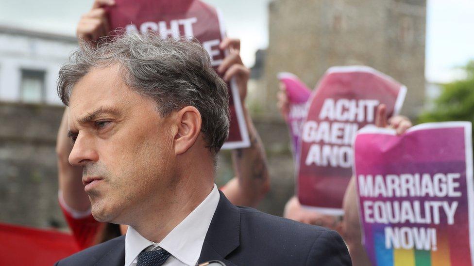 Julian Smith met by protesters at the Guild Hall