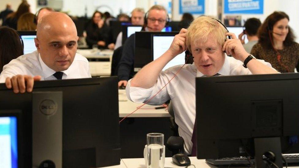 Sajid Javid and Boris Johnson at a call centre