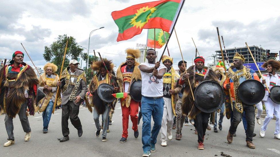 OLF supporters with a flag