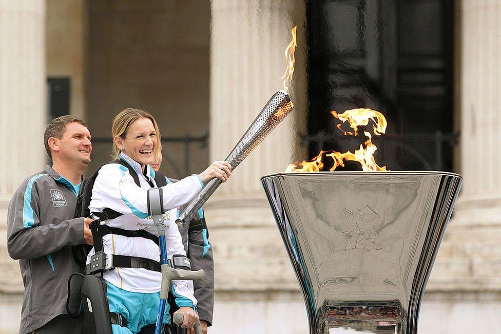 Claire Lomas lights the cauldron in Trafalgar Square, during the Paralympic Torch Relay, on August 24, 2012 in London