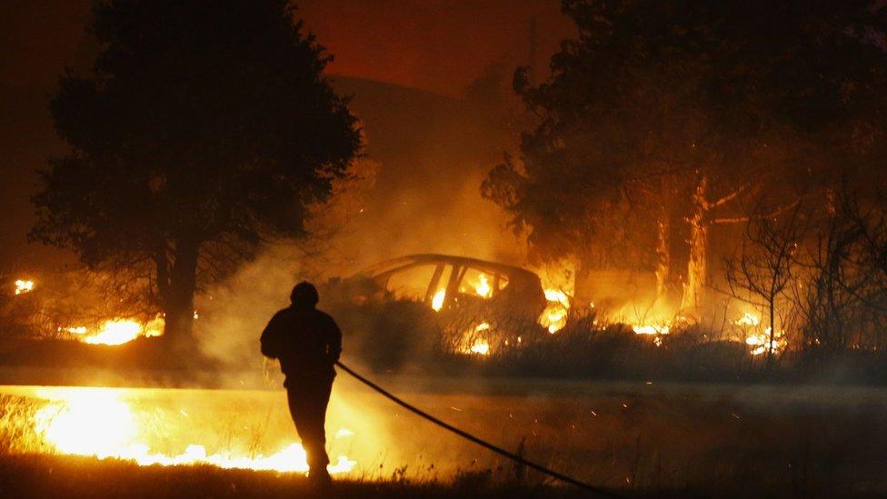 A burnt-out car in Biguglia, Corsica