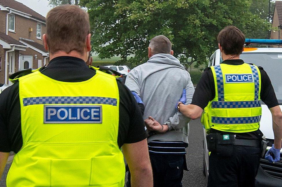 Northumbria Police officers making an arrest