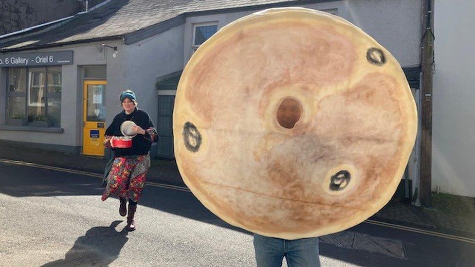 Man dressed as a giant Welsh cake