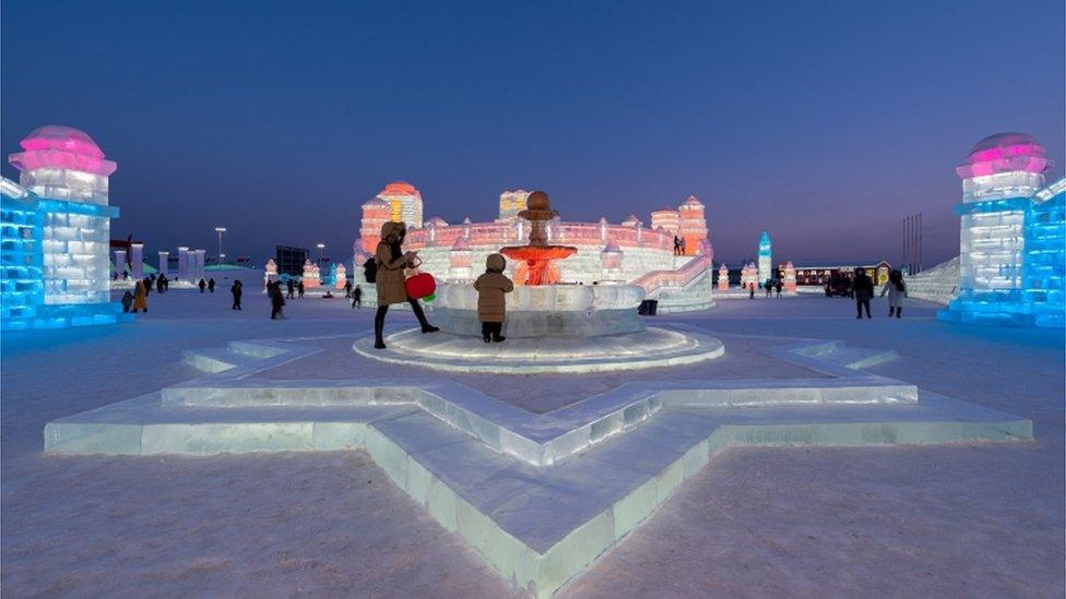 people-attending-the-ice-and-snow-sculpture-festival