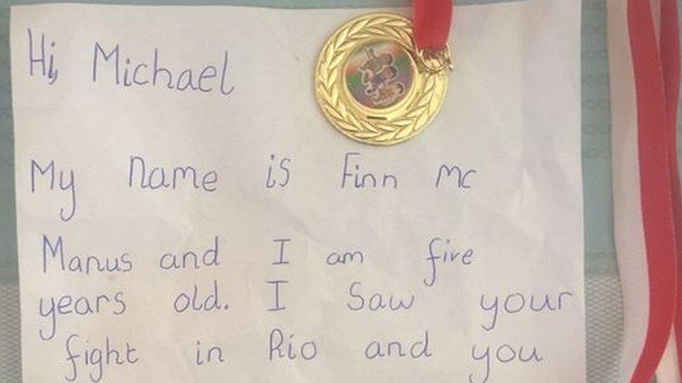 The letter and medal that Finn McManus wanted to send to boxer Michael Conlon