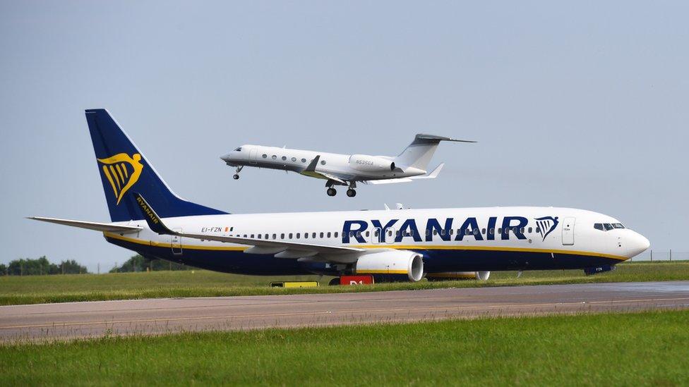 A Ryanair plane and private jet