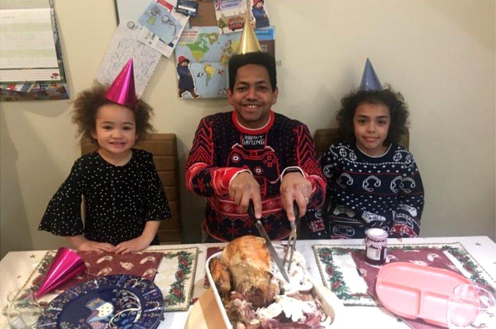 Amelia, Antonio and Sami Caraballo having Christmas dinner