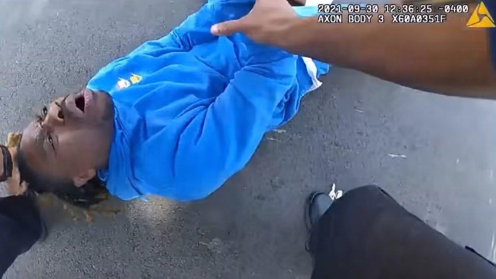 Police bodycam footage showing officers dragging the man from his car