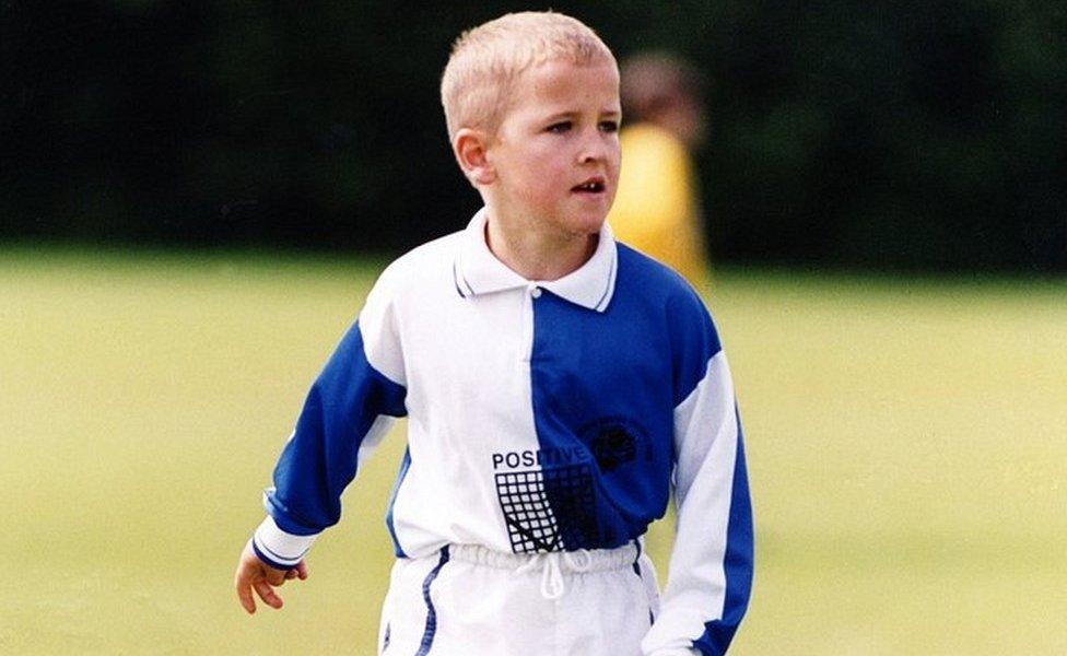 Harry Kane, age 7, playing football