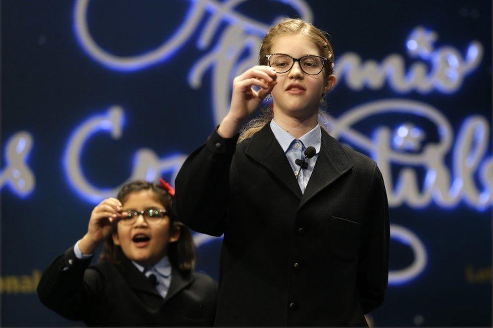 School children sing out the number of the top prize of Spain's Christmas lottery known as "El Gordo"