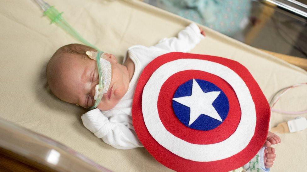 Baby in a Captain America costume