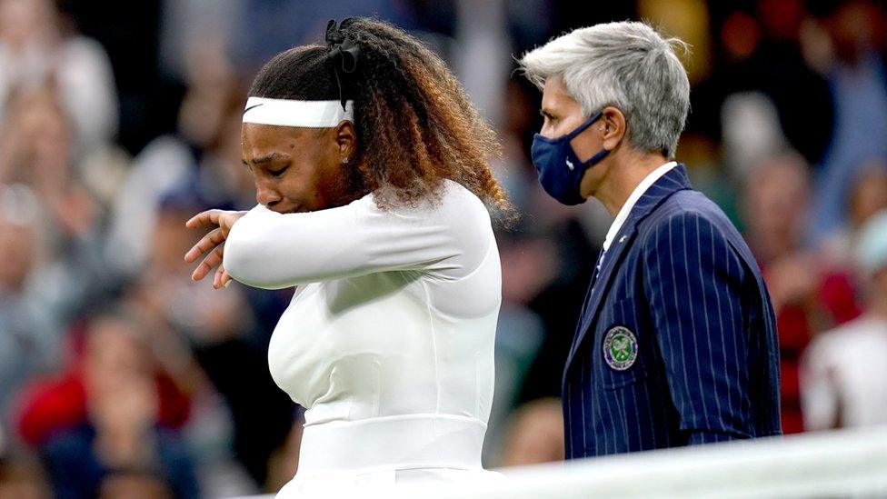 The umpire came down to the court to help an upset Serena Williams off the court