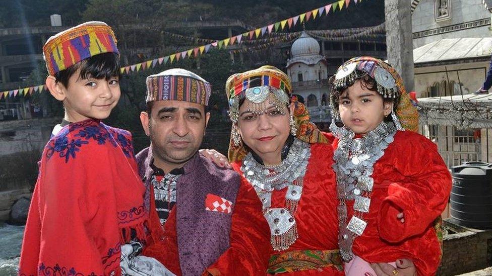 Aroen Kishen and his wife Seema with two of their children