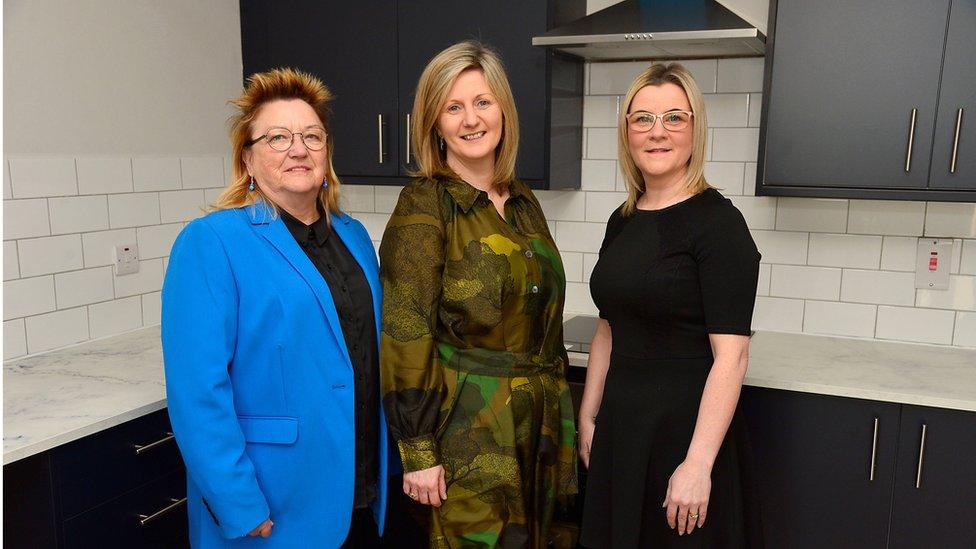 Housing Executive Chief Executive Grainia Long (centre), pitcured with Chief Executive of The Welcome Organisation, Jo Daykin-Goodall (left) and Lee-Marie Hughes