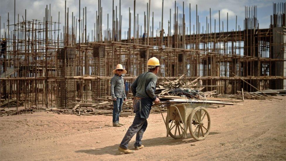 Chinese workers working on railway infrastructure on the new tracks linking Djibouti with Addis Ababa on 5 May, 2015