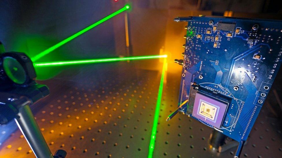 Laser light being reflected