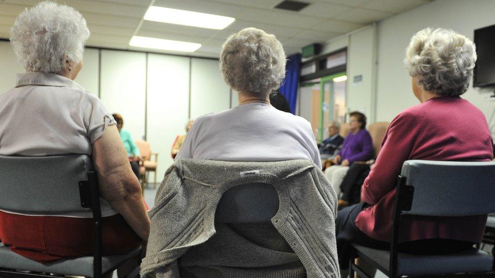 Elderly people in a care home