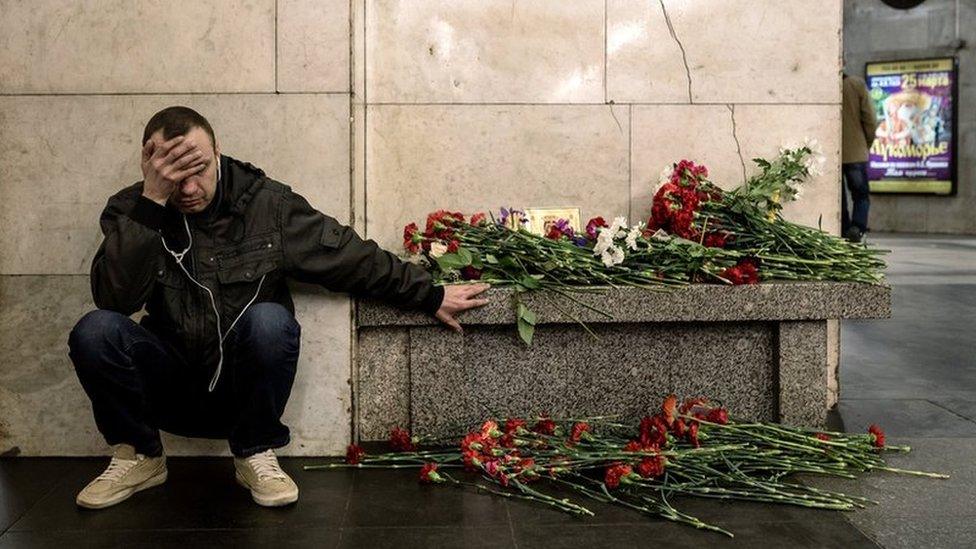 Russian man mourns at a platform of a metro station Tekhnologicheskiy Institute in memory of the victims of a nearby explosion in St. Petersburg metro - 4 April 2017