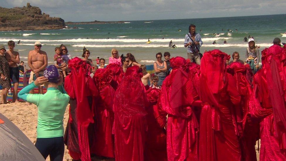 Campaigners on the beach in Cornwall