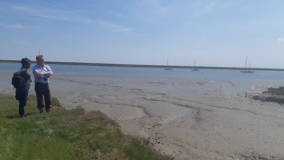 Standing on the shoreline in Paglesham, Essex