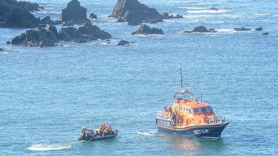 RNLI crews conducting a rescue off Bigbury