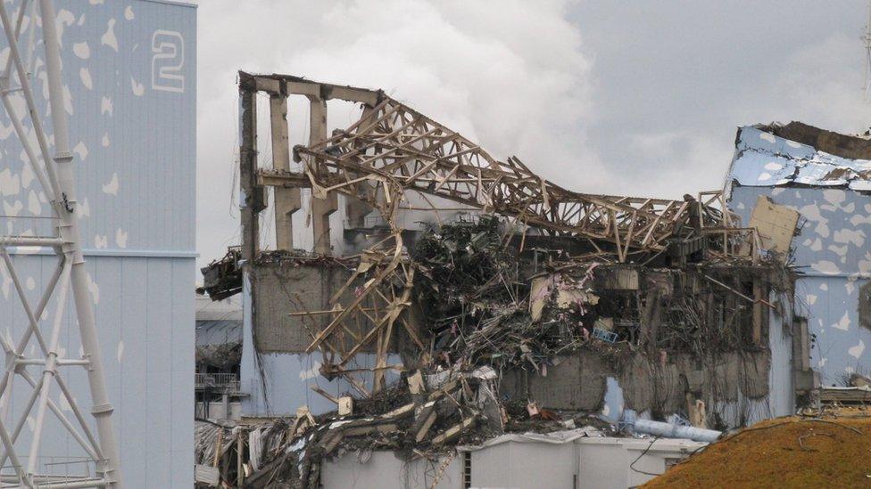 15 March 2011 photo taken and provided by Tokyo Electric Power Co. (TEPCO), showing the destroyed remains of the Unit 3 reactor building in the Fukushima Dai-ichi nuclear power plant in Okuma, Japan.